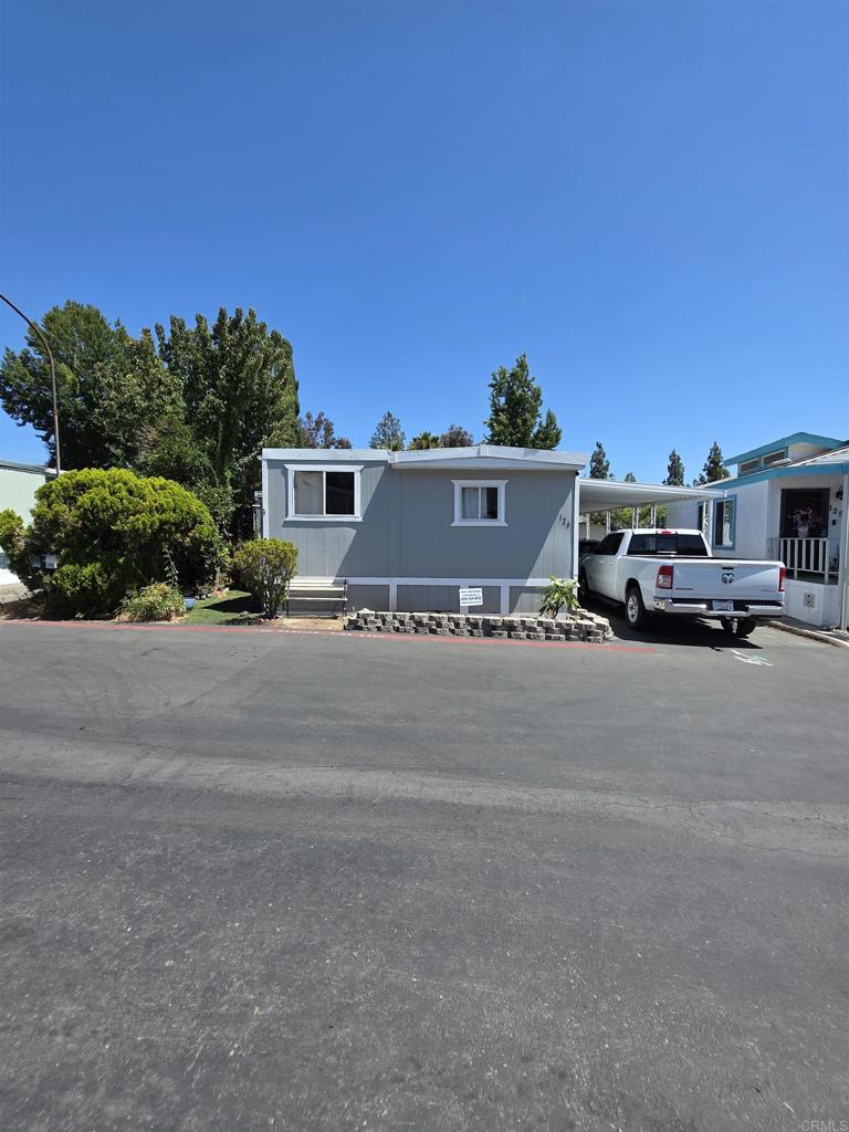 A well positioned manufactured home with solid structure, priced for buyers ready to roll up their sleeves. Whether you're looking for a tasteful renovation project or a comfortable home with instant access to resort style amenities, this one delivers. Priced at only $120,000.00 this property won’t last!