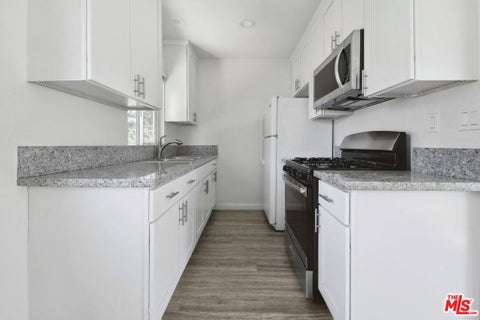 Photo of 6612 De Longpre Avenue #5, Los Angeles, CA 90028 (MLS # 26102861)