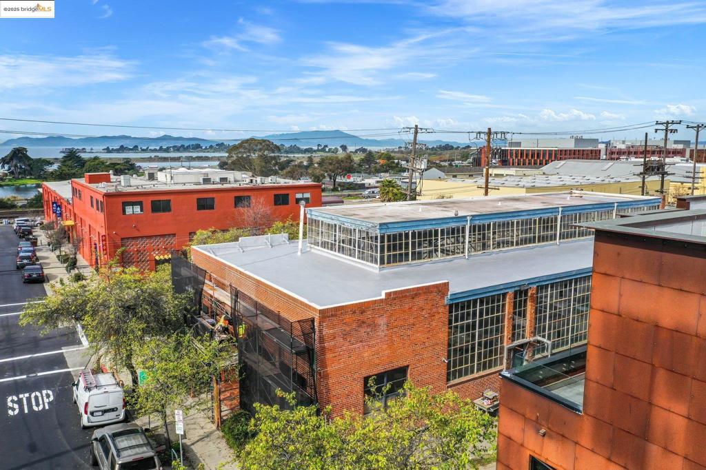 Discover 739 Channing Way, a distinctive development in West Berkeley, offering 14 modern rental Townhomes and a Commercial Unit in a vibrant mixed residential and industrial zone. The western section features four three-story live/work units and a retail space, perfect for artists and craftspeople seeking a creative environment. Each unit includes a private rooftop terrace, enhancing the live/work experience. The residential area boasts three-story townhomes, each with a private garden and street access, fostering community and privacy. High-quality materials like integrally colored lime plaster, Corten steel, and painted cement shiplap siding ensure durability and aesthetic appeal. Large windows and 9-foot ceilings fill the units with natural light, creating inviting spaces. Located in Dynamic Berkeley, 739 Channing Way offers easy access to local amenities, dining, and cultural attractions, ideal for those seeking a balanced urban lifestyle.