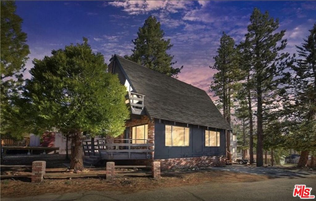Charming A-Frame Cabin Near the Lake $1,895/Month. This beautifully remodeled A-frame cabin offers 2 bedrooms, 1.5 bathrooms, and a versatile third sleeping area. Enjoy cozy evenings by the wood-burning fireplaces located in both the living room and primary bedroom. The updated kitchen and bathrooms blend modern touches with mountain charm. Additional features include air conditioning, a tankless water heater, a newer roof, and a spacious new sun deck perfect for relaxing or entertaining outdoors. Located just a few blocks from Holloway's Marina, you'll have easy access to boating, fishing, and all your favorite lake activities. Most furnishings are included, making this home move-in ready. Don't miss this one-of-a-kind rental schedule your tour today!