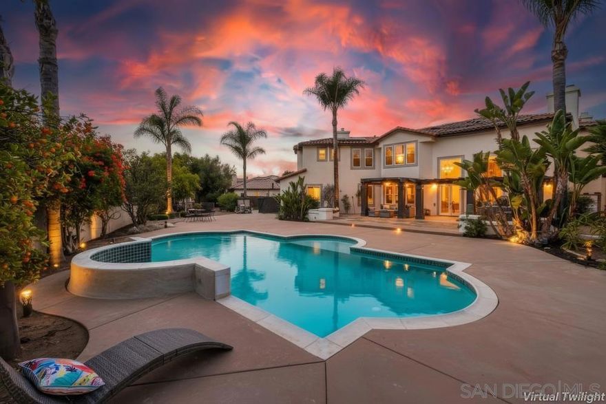 Located in the prestigious gated community of Bel Etage in Santa Fe Valley, this exquisite residence sits on a generous 0.4-acre cul-de-sac lot, offering both privacy and luxury in one of North County San Diego's most desirable neighborhoods. Surrounded by open space on one side and nestled at the end of a quiet street, this home offers 5 bedrooms with ensuite baths (1 BR/BA downstairs).  The flexible floor plan offers formal living and dining rooms, a gourmet kitchen, a large family room with 20+ foot high ceilings, a luxurious primary retreat complete with a sitting room, double-sided fireplace, spa-inspired bathroom and a spacious walk-in closet.Step outside into your private backyard oasis, where resort-style living awaits. The expansive yard includes a sparkling pool, a built in BBQ, a covered sitting area, a custom-built Redwood Tea House, a cozy fire pit, and beautifully landscaped areas for lounging, dining, and entertaining under the stars.  Additional highlights of this exceptional property include a four-car garage, owned solar and EV charger. Home is part of Poway Unified School District, known for its academic excellence. Located in the prestigious gated community of Bel Etage in Santa Fe Valley, this exquisite residence sits on a generous 0.4-acre cul-de-sac lot, offering both privacy and luxury in one of North County San Diego's most desirable neighborhoods. Surrounded by open space on one side and nestled at the end of a quiet street, this meticulously maintained home is part of an exclusive enclave of just 100 executive residences. Beyond the stunning front facade, you're welcomed into a grand entrance filled with natural light, soaring 20-foot ceilings, and a dramatic wraparound cascading staircase. The spacious and flexible floor plan offers formal living and dining rooms ideal for entertaining, while the thoughtfully designed gourmet kitchen is the heart of the home. Featuring dual granite-topped islands, stainless steel appliances, a new designer backsplash, and two walk-in pantries, the kitchen flows seamlessly into a cozy breakfast nook and an inviting family room. A hidden room tucked off the main floor adds a unique touch, perfect for use as a wine cellar, playroom, or a dedicated home office or gym tailored to suit your lifestyle.  The first floor includes a private guest suite with its own full bathroom, while the upstairs is highlighted by a luxurious primary retreat complete with a sitting room, a romantic double-sided fireplace, a spa-inspired bath with soaking tub, dual vanities, and a spacious walk-in closet. Three additional upstairs bedrooms each feature their own ensuite bathrooms, providing comfort and privacy for family or guests.  Step outside into your private backyard oasis, where resort-style living awaits. The expansive yard includes a sparkling pool, a built in BBQ, a covered sitting area, a custom-built Redwood Tea House, a cozy fire pit, and beautifully landscaped areas for lounging, dining, and entertaining under the stars.   Additional highlights of this exceptional property include a four-car garage, owned solar and EV charger. Home is part of Poway Unified School District, known for its academic excellence. Ideally located west of Rancho Bernardo and just east of Rancho Santa Fe, this elegant estate offers proximity to top-rated schools, scenic hiking trails, and all the best that North County has to offer. This is more than a home it's a lifestyle.