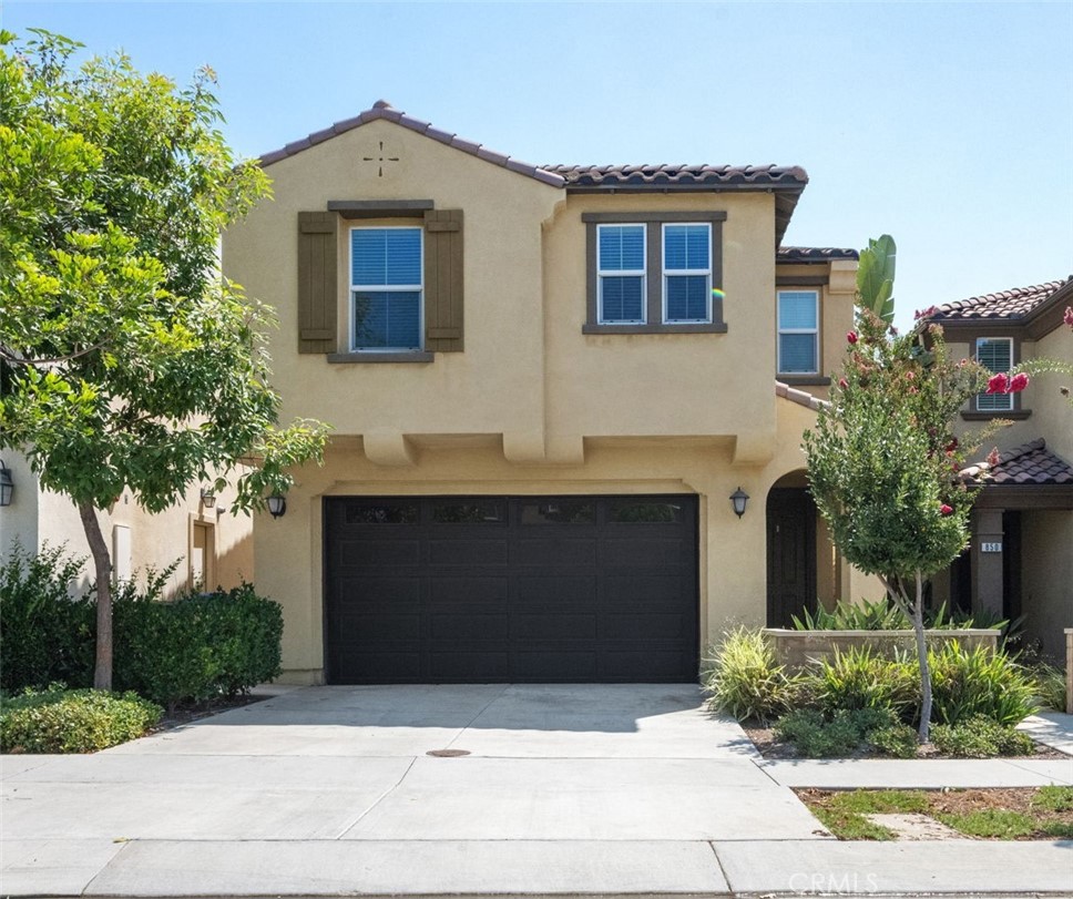 Welcome to this move-in ready home in a secure gated community, offering a spacious open-concept layout filled with natural light. Built in 2018, this 4-bedroom, 2.5-bathroom residence spans 2,193 sq ft and features energy-efficient windows and HVAC. The main level boasts a gourmet kitchen with quartz countertops, seamlessly connecting to the dining area and great room, complemented by wood-look vinyl flooring and recessed lighting. The primary suite includes a walk-in closet and a spa-like en-suite with dual vanities, a soaking tub, and a glass-enclosed shower. Three additional bedrooms—one with a walk-in closet and two with mirrored doors—share a full bath with dual sinks. Additional features include a finished 2-car garage and a tankless water heater. Community amenities include an Olympic-size pool, spa, fitness center, and playground. Ideally located near shopping, dining, the 210 Freeway, and local entertainment, this home offers comfort, style, and convenience in one of the area’s most desirable neighborhoods.