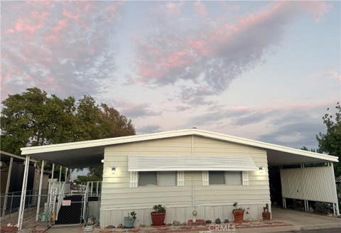 Photo of 13393 Mariposa Road #81, Victorville, CA 92395 (MLS # HD26186706)