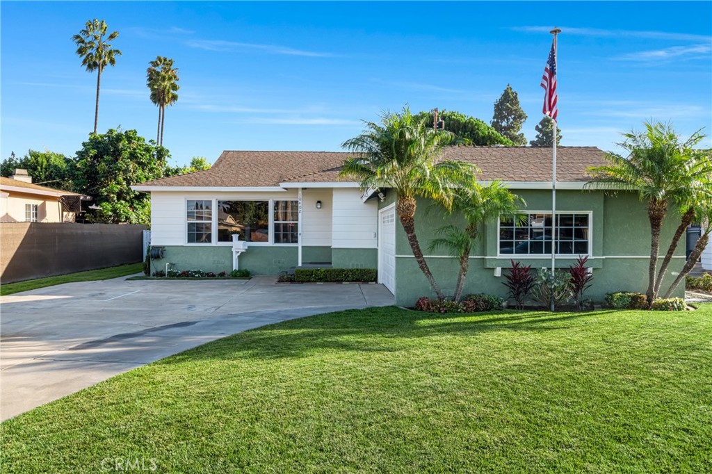 Welcome to this beautiful Garden Grove home where comfort meets care. The moment you walk through the door, you feel it — the warmth, the calm, and the sense that this home has been loved. The spacious living area invites you to unwind, with laminate wood floors flowing throughout and plush carpet in the bedrooms for that soft landing at the end of the day. The updated kitchen shines with rich cabinetry, granite countertops, and stainless-steel appliances — blending practicality with timeless style. A cozy bonus room offers flexibility for a home office, playroom, or reading retreat. The inside laundry and attached 2-car garage add everyday convenience, while central A/C keeps the home cool year-round. Step outside to a large backyard designed for easy living — a brand-new covered patio for entertaining, a shed for extra storage, and plenty of open space to relax or play. The backyard is large enough for an ADU (check with city). The wide driveway even offers RV parking for your next adventure. Clean, well-maintained, and full of heart, this home has been thoughtfully cared for from day one. Nestled in a quiet neighborhood close to schools, parks, shopping, and freeways — this home is more than a house; it’s a feeling.