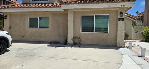 Photo of 545 Hamilton Drive, Corona, CA 92879 (MLS # IG26100448)