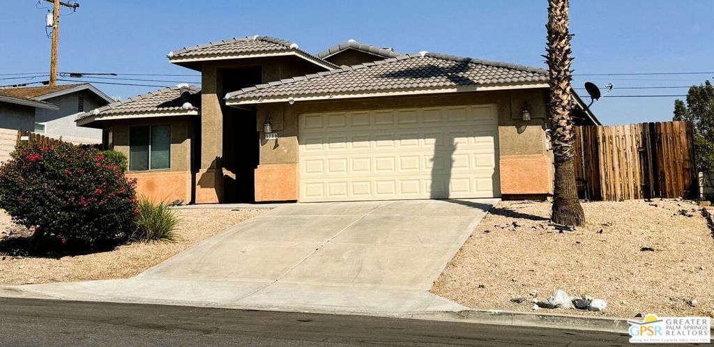 This home is located high on the hill in a quiet residential area north of Mission Lakes Blvd. Built in 2002 this home features 3 bedrooms and 2 baths. Open floorplan with vaulted ceilings and fireplace in living room. Fresh paint from top to bottom with new carpeting in living room and bedrooms and tile flooring in dining room kitchen hallway and baths. The kitchen comes equipped with newer gas range, new dishwasher and a garbage disposal. Inside laundry and utility closets. The yard has desert landscaping for in the front with open space in the backyard waiting to be landscaped or to install a pool. There is a concrete patio off the back of the house accessible from the living room or primary bedroom perfect for outdoor entertaining. This home would be perfect for a family with school age children as Bella Vista Elementary and Painted Hills Middle schools are very close by. New mini blinds in all widows and new vertical blinds on the sliders. There is also an attached 2-car garage. Set up an appointment to view this great property today!