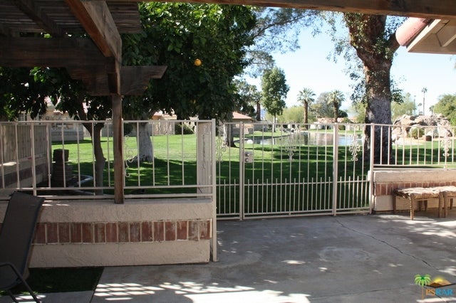 Photo of 49041 Eisenhower Drive, Indio, CA 92201 (MLS # 219150701PS)
