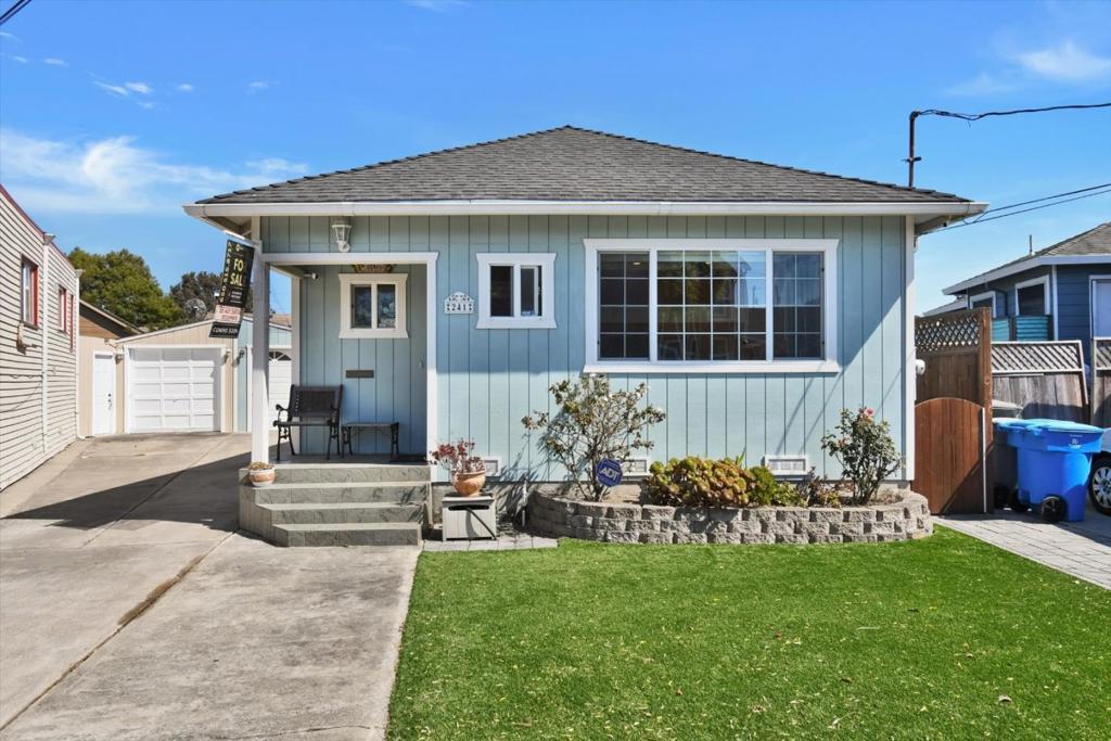 Welcome to this charming 2-bedroom, 1-bath home in the desirable San Bruno Park neighborhood affectionately known as the heart of San Bruno for the unique heart-shaped curve of the street. Built in 1920 and completely remodeled in 2002, this 910 sq ft gem beautifully blends timeless character with modern updates. Thoughtfully renovated inside and out with a major 2002 update new roof, windows, siding, kitchen, bath, plumbing, electrical, and central heating plus recent upgrades including artificial lawn (2020), new appliances, and water heater (2023). Enjoy a light-filled interior, functional layout, and true move-in ready convenience. The private, enclosed backyard features a tranquil koi pond perfect for relaxing or entertaining. Additional highlights include a 1-car garage with workshop, shared driveway for off-street parking, and a prime location near the brand-new San Bruno Community Park, shopping, dining, and major commuter routes. Don't miss your chance to own a piece of San Brunos heart!