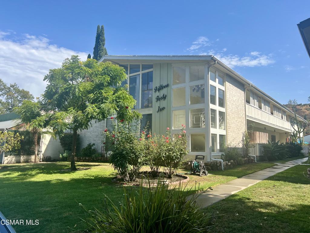 Beautiful private and spacious 2bed/2ba condo located in the Rancho neighborhood on the Burbank/Glendale border. Only 7 units in building, with no unit below and private stairs to unit. Hardwood flooring throughout the home. An open floor plan lends to a great entertaining space leading to a beautiful 400 sqft outdoor area over looking the pool and mountains. Definitely a must see if you love outdoor spaces. The unit also includes 2 storage spaces and one covered parking space. Private Laundry room located by carport area. HOA pays for Water, trash, gardener and pool maintenance.