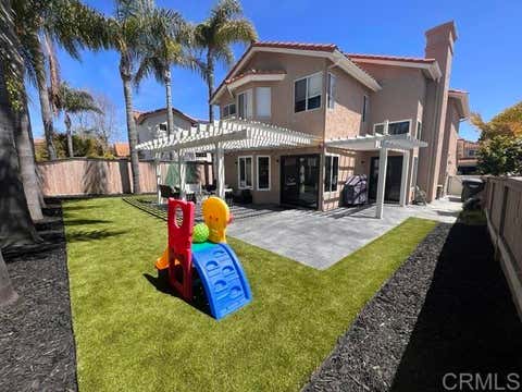 Photo of 1967 Spanish Oak Way, Vista, CA 92081 (MLS # NDP2605877)