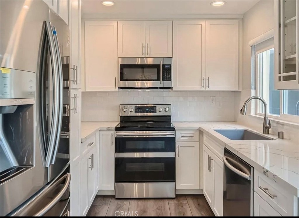 Fully Remodeled Coastal Retreat in Niguel Beach Terrace. Enjoy the best of beachside living in this beautifully renovated upper-level end unit just across the street from world-famous Strand Beach. This stunning 2-bedroom, 2-bath condominium in Niguel Beach Terrace offers a light-filled open layout with ocean breezes and coastal charm throughout. Step into a gorgeous chef’s kitchen featuring all new stainless steel appliances, modern cabinetry, and sleek countertops. Both bathrooms have been fully remodeled with stylish finishes, while the spacious living areas showcase new laminate flooring, ceiling fans, and custom blinds. Enjoy two private balconies—perfect for relaxing or entertaining—plus mirrored wardrobe doors, new windows and doors, and lots of natural light. Just moments from the sand, scenic trails, Dana Point Harbor, and downtown shops and dining, this turnkey home offers the ultimate in beach-close living!! Available after August 1.