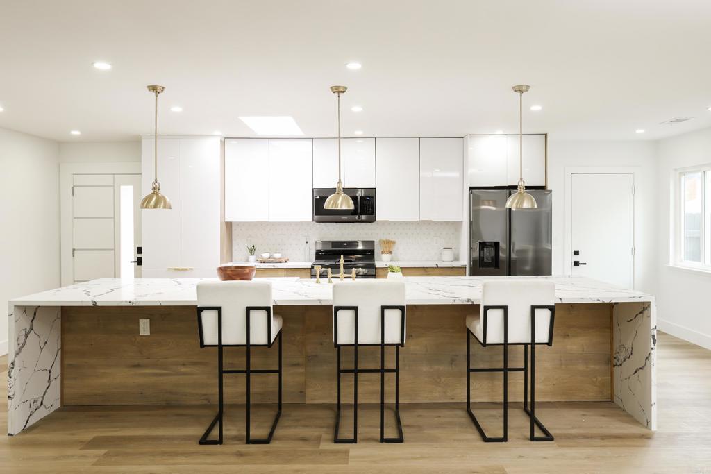 Welcome to 4380 Rolfe Rd, a beautifully remodeled 3-bedroom, 2-bathroom home offering 1,658 sq ft of thoughtfully designed living space in the heart of North Clairemont. Located just minutes from San Diego’s stunning beaches, this home combines style, comfort, and convenience in one of the city’s most desirable neighborhoods. From the moment you arrive, the curb appeal stands out with sleek modern wood siding, contemporary lighting accents, and freshly installed low-maintenance artificial grass in both the front and back yards—perfect for easy outdoor living year-round. Inside, you’ll find a modern open layout that’s ideal for entertaining or relaxing, with spacious bedrooms, updated bathrooms, and high-end finishes throughout. Whether you're enjoying a quiet evening at home or heading out for a night on the town, you’re perfectly situated—within walking distance to grocery stores, movie theaters, restaurants, and more. This turnkey gem blends the best of beachside living and urban convenience. Don’t miss your opportunity to call 4380 Rolfe Rd home!