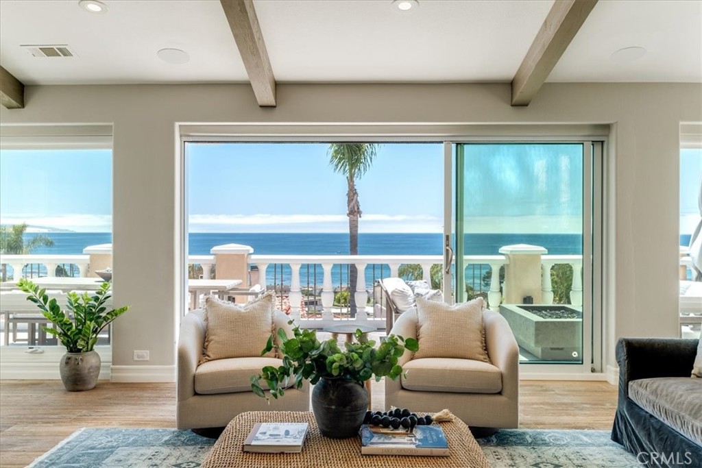 $600K in upgrades of this stunning elevated panoramic ocean view Pismo Beach home. One of the best locations within Spyglass Ridge with views from Avila to Vandenberg, almost every room enjoys wide ocean sights. Walk or bike to Shell Beach, the Pismo Preserve hiking trails, Pismo Beach and Bob Jones Trail to Avila Beach.
Every inch of this home has been thoughtfully updated with luxury touches. White hardwood oak flooring, tongue & groove white oak ceilings, all new Milgard windows and sliding doors, Restoration Hardware lighting fixtures throughout, marble and stone counters, hand-made imported tiles, central heat and air, Sonos wifi surround sound throughout, solid wood doors and closets, and 220 EV charger. There's even potential space for a future elevator.
The main level features open concept living areas with a seamless flow between indoor and outdoor living. A wall of windows was converted to a set of oversized multi-slide doors and the balcony was extended out to 13 feet to soak up a truly al fresco living experience.
The entire main level enjoys open ocean views. The kitchen has been completely renovated with luxury Wolf 5-burner stove, double oven and microwave, Thermador cabinet-faced fridge, new cabinetry with soft close drawers, walk-in pantry, bar seating, and breakfast eating area. The living room flows seamlessly from the kitchen and dining room and enjoys a large gas fireplace and a cozy wine bar nook seating area.
The lower level features the primary bedroom retreat complete with a large private ocean view balcony, gas fireplace, expansive ensuite bathroom with large walk-in shower and separate soaking tub, both with ocean views, spacious walk-in closet with an extensive $30K built-in organizational system and 315-bottle wine storage area. Two additional bedrooms on this level, one of which makes a great office with ocean views and a built-in Queen Murphy bed, and a hallway full bathroom. Immaculate garage with epoxy flooring, extensive built-in storage and work bench area.
Enjoy the daily tranquility of these unsurpassed coastal views, and have a front row seat to the 4th of July Pismo fireworks and Vandenberg launches. This home has been meticulously and lovingly cared for by the current owners for the last 10 years, and it's ready for new owners to bask in all the Central Coast has to offer without having to lift a finger in home renovations.
Information deemed reliable buyer to do their own due diligence.