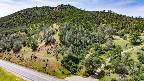 Photo of 401 Watertrough Rd Rd, Clearlake Oaks, CA 95423 (MLS # LC26085576)