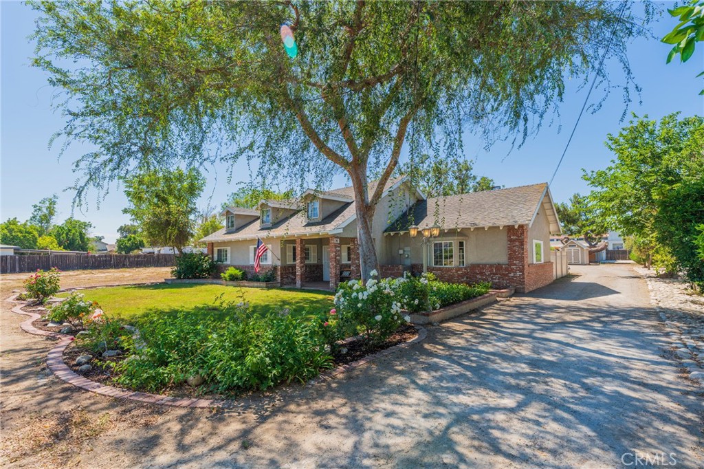 Your Norco Dream Estate Awaits: Classic Ranch on Nearly 2.5 Acres in Horsetown USA!
Welcome to 2878 2nd Street, Norco, California – an unparalleled opportunity to own a custom-built classic ranch-style home on an expansive 105,851 sq ft lot (approximately 2.43 acres). Priced at $1,499,900, this 3-bedroom, 2-bathroom, 1688 sq ft residence, built in 1956, offers the quintessential Norco lifestyle.
The exterior boasts timeless used brick accents, while the interior reveals a fresh, contemporary transformation. Discover new luxury vinyl plank flooring throughout, fresh paint, and custom coffered vaulted ceilings that elevate every space. The gorgeous kitchen is a chef's delight, featuring custom cabinetry, Corian counters, and over the sink window that overlooks the front porch with a clear mountain view on sunny days.
Relax and entertain in the stunning family room, complete with a cozy used brick fireplace, a charming sitting window seat, custom storage cabinetry, and a magnificent stained glass window. A formal dining area flows seamlessly from the kitchen, leading to the most beautiful sunroom you've ever seen – illuminated by three skylights and a wall of windows that frame the enchanting backyard courtyard. This private oasis boasts an incredible mature walnut tree, elegant pavers, a serene sitting area, vibrant flowers, lush greenery, playful butterflies, hummingbirds, and a charming gazebo.
Beyond the main residence, the property offers unparalleled utility: a detached three-car sized garage, two significant covered parking areas perfect for an RV or motorhome, and a very large shop (formerly a barn) with its own generous covered area. A storage shed and a large tack room provide ample space.
With this vast, flat acreage, your dreams are limitless! The City of Norco allows for the construction of one ADU and one Junior ADU, and you can house up to 27 animals on this lot. Imagine building your dream: is it to own animals, run a home business from the spacious shop, or simply enjoy abundant extra parking and create your own family farm? Anything is possible with this extraordinary property.