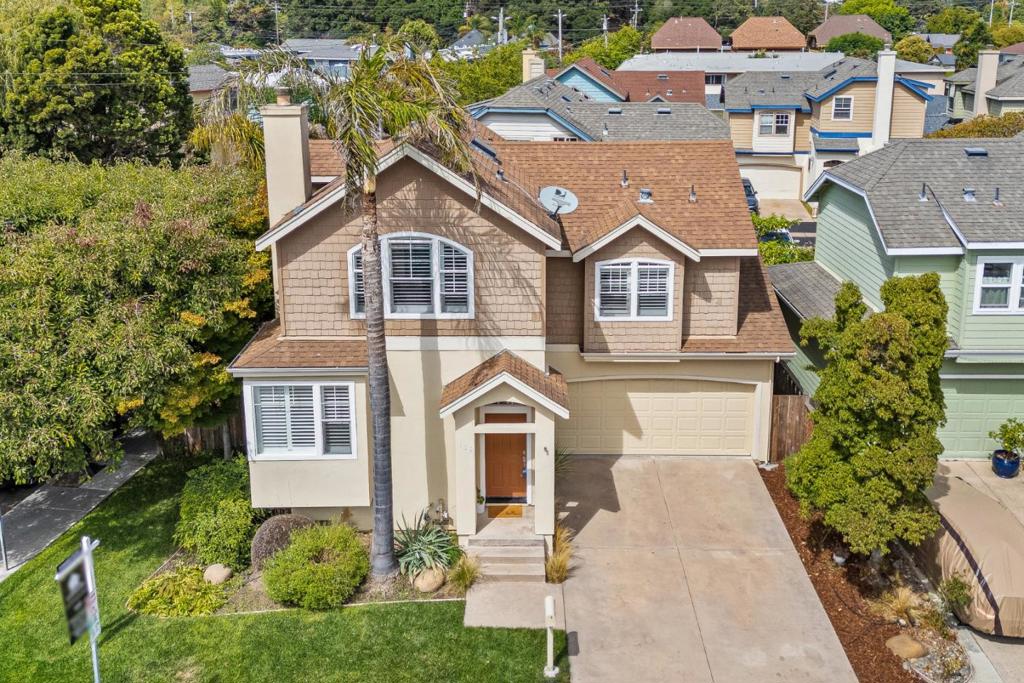 Downtown Dream Opportunity! Steps away from the surf and sand, and just a stones throw from shops, dining, and entertainment, you can experience the best of downtown Santa Cruz without leaving home. Located on a peaceful cul-de-sac, this turnkey Mediterranean-style home offers 1,254 square feet of living space, featuring three bedrooms and 2.5 bathrooms. The newly updated interior is immaculate with hardwood floors throughout, granite countertops, stainless steel appliances, a fireplace, and vaulted ceilings that capture abundant natural light. The outdoor space includes low-maintenance landscaping with mature palm trees, a deck, and a patio with a water feature, offering plenty of room to host guests al fresco. There's an attached two-car garage, so you can park at home and easily walk to the beach or downtown shops within minutes. If you snooze, you'll lose, and you won't want to sleep on this downtown dream come true!