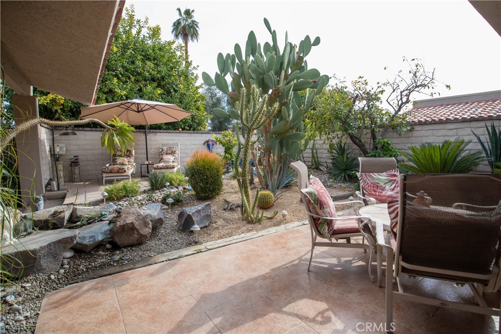 Welcome to Your Serene Oasis in The Springs, Rancho Mirage. Step into timeless elegance in this 4-bedroom gem, nestled within the prestigious Springs Country Club. Sunlight floods the open-concept interior, highlighting rich wood floors and framing breathtaking mountain views through expansive windows. Outside, a tranquil Zen garden offers the perfect space to relax, recharge, or entertain beneath the desert sky. Live the lifestyle you deserve with access to championship golf, tennis, and vibrant community amenities. This is more than a home—it’s a refined escape blending luxury, light, and serenity. Don’t miss your opportunity to experience The Springs at its finest.