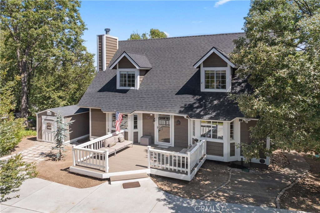 Pride of ownership throughout, as clean as they come!! Full lake rights to private Lake Arrowhead and remodeled in 2020 just before Sellers purchased. 1164 Klondike offers a light and bright ambiance with a uber functional floorplan: primary en suite and laundry room conveniently located on the entry level! The entire front of this 8,500 sq ft parcel is flat, boasting a massive 71’x31’ U shaped concrete driveway perfect for multiple guest parking, RV or boat parking! Enjoy family BBQs from a large rear deck beneath a canopy of Oak Trees and beautiful panoramic views of the North East high desert landscape. Plenty of storage via a shed directly accessed from driveway and basement currently set up as a workshop. Upon entry you are greeted with beautifully tiled flooring throughout the main living level. A soothing color palette blankets the walls and tongue and groove open beamed ceiling. Enjoy chilly winter nights nestled up next to a cozy river rock wood burning fireplace. Custom cabinetry offers plenty of storage within the spacious kitchen equipped with stainless appliances and breakfast bar top. LED lighting illuminates the tastefully selected hardware and lighting fixtures. Entry level offers a spacious primary en suite with ¾ bathroom, powder room bath/laundry room. Upstairs hosts 2 guest bedroom en suites(both with full baths) each with tall vaulted ceilings and cozy reading nook dormers. New roof and 96% HVAC system with central A/C installed when remodeled. Located off a quiet low traffic road Grass Valley Alley. There’s a staircase down to Klondike for more curbside parking/walk up access if needed. This property has been well loved by the Sellers and surely a front runner of its price range. Just in time for holidays in the mountains, schedule your private tour today!