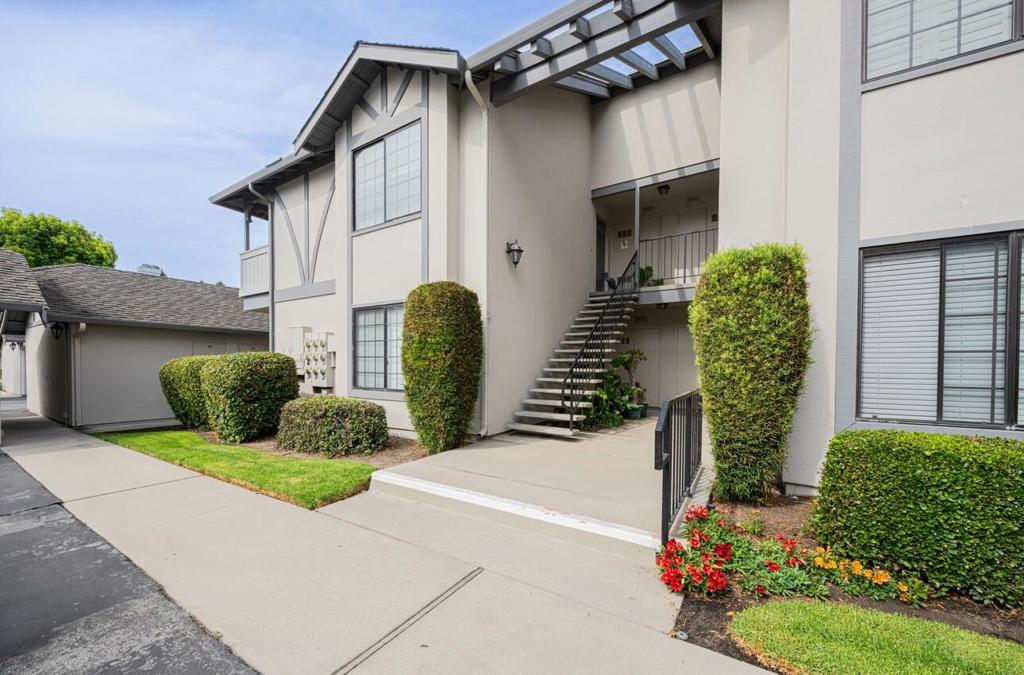 Light-filled and inviting, this charming upper-level home is tucked inside the gated Westwood Village community. Step into a cozy living room with a fireplace that opens seamlessly to a bright dining area and a small private garden patio, perfect to bring the outside in. The kitchen offers a pantry for extra storage and the convenience of an in-unit washer and dryer. The spacious primary bedroom features a walk-in closet, while the guest bedroom and generously sized bathroom provide comfort and flexibility. Thoughtful storage solutions are found throughout the home, and a detached one-car garage is included. Ideally located in South Salinas, this home is close to shopping, dining, and everyday conveniences. Westwood Village is a well-maintained complex offering residents peace of mind with gated entry, along with a pool, clubhouse, and BBQ area for gatherings and relaxation. This complex is for owner-occupied purchasers only.