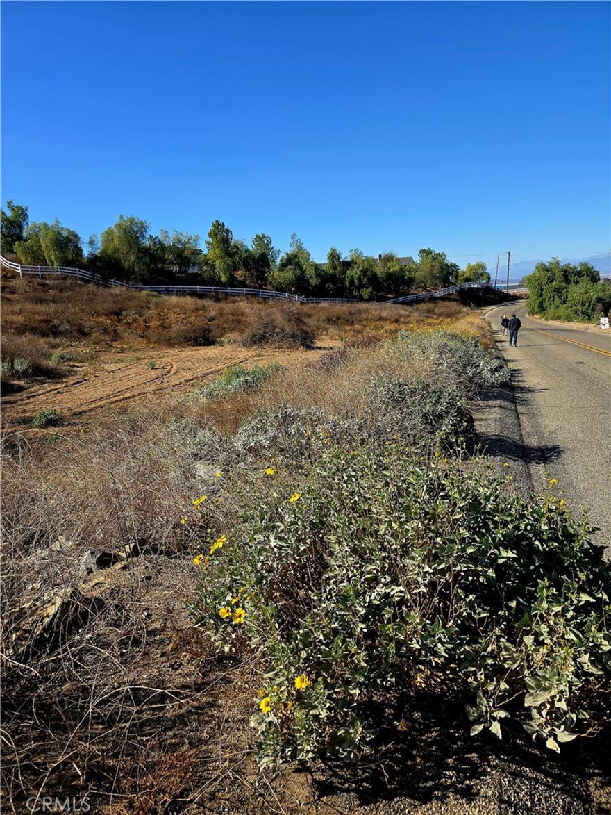 Great opportunity to own a prime piece of land in the magnificent area of Lake Mathews. With views of the lake  the possibilities are endless! Surrounded by custom build homes, this land of 3.6 acres sits on a slope hill, but mostly flat. Your dream home awaits you!