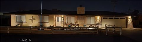 Photo of 21535 Pine Ridge Ave, Apple Valley, CA 92307 (MLS # CV26031565)