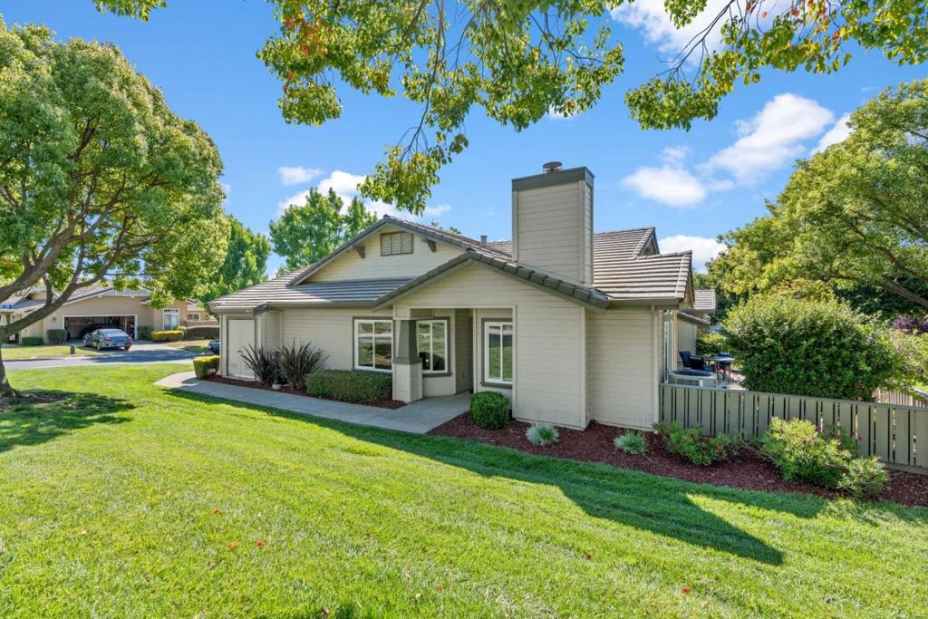 Located in the Beautiful and Prestigious Olivas Village, in The Villages Golf & Country Club, a 55+ senior guard gated community. This wonderful single level end unit has no stairs and is surrounded by lush greenbelt space. The living room is spacious with High ceilings which gives it a large, open feeling. The fireplace is all electric with a beautiful new facade. 1.5 years ago the entire interior was remodeled and new double pane windows added. The interior was painted and Luxury vinyl flooring was installed throughout the home. The kitchen has a new oven/range unit, newer stainless steel appliances new cabinets and counter tops. Recessed lighting was added to the kitchen, living room and dining room. The Primary bedroom has an alcove that can be used for desk space or a reading spot as well as a door to a private front patio. It has a spacious large walk-in closet plus additional closet space. The master bathroom was fully remodeled with an oversized luxury shower and plenty of cabinets and counter space. The hall bath was also fully remodeled. The back patio is lovely with a bit of a view of the mountains and a gate to access open space at the back side of the property. The Villages has an amenities galore, including Golf, tennis, pickle ball, bocce, gym pools and more .