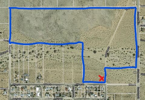 Photo of 5814 Sunburst, Joshua Tree, CA 92252 (MLS # JT26020602)