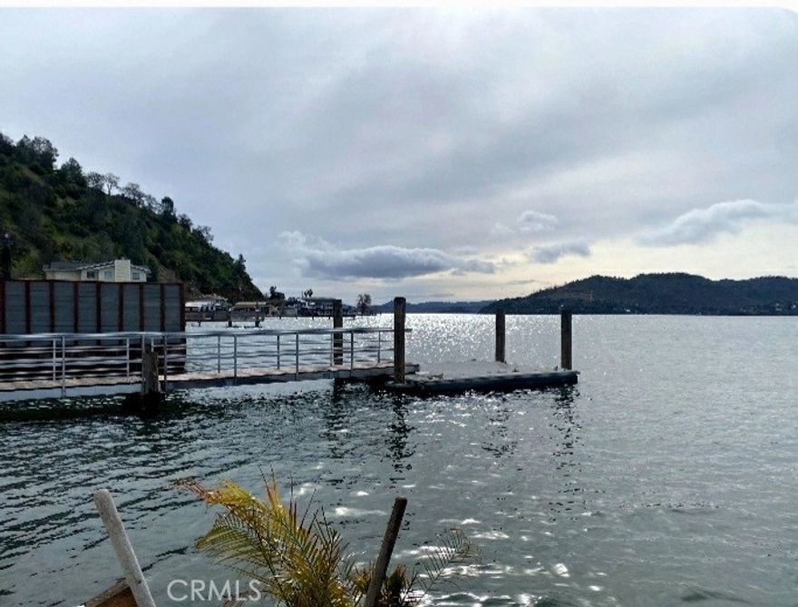 A fun, family and friend's retreat! Imagine days filled with boating, fishing, jet skiing, or even paddle boarding all from your own private dock and beach!   A view of the lake from every room of the 3 bedroom/ 2 bath house.  This is a true MUST see!  Good times and memories await you and yours!