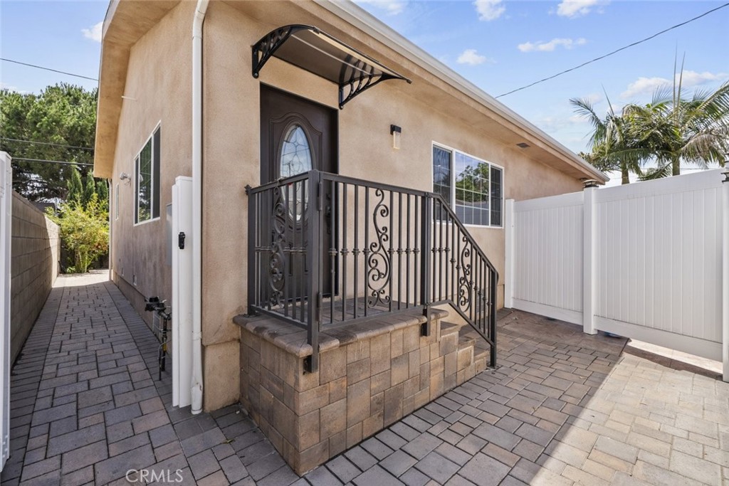 This well-maintained 3-bedroom, 2-bathroom home offers 1,200 square feet of thoughtfully designed living space, ideal for a variety of lifestyles. The interior features an open and airy layout with plenty of natural light and clean, modern finishes throughout. The spacious living area connects seamlessly to the dining space and functional kitchen, which offers generous cabinetry and counter space to meet your daily needs. The primary bedroom includes an ensuite bathroom, while two additional bedrooms share a full second bath perfect for guests, roommates, or a home office setup. Enjoy outdoor living with a private backyard, ideal for relaxing, entertaining, or enjoying your favorite hobbies. Additional features include a dedicated laundry area and convenient off-street parking. Located in a quiet neighborhood close to parks, schools, shops, dining, and major commuter routes, this home delivers both comfort and convenience.