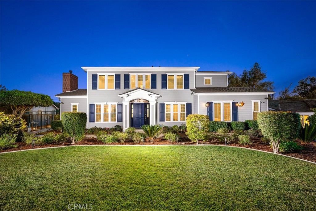 Built in 2015 and ideally positioned on a tranquil north-south facing street, this elegant residence offers both convenience and serenity. With approximately 4,580 sq.ft. of living space, the home features 5 bedrooms and 6 bathrooms, blending functionality with refined comfort. Step into a grand foyer with soaring ceilings, a statement chandelier, a sweeping wrought-iron staircase, and paneled walls that set the tone for luxury. Rich details include hardwood floors, expansive windows that flood the interiors with natural light, and beautifully designed arched ceilings. The formal living and dining rooms flow seamlessly, creating a spacious setting for entertaining. A private study with custom cabinetry and coffered ceilings offers an ideal retreat for work or quiet reading. The main kitchen showcases granite countertops, a large center island, custom cabinetry, a Sub-Zero refrigerator, and a breakfast nook. A separate wok kitchen with a walk-in pantry and high-powered stove ensures every culinary need is met. The expansive family room includes a built-in wet bar and opens directly to the backyard with a sparkling pool and waterfall feature—perfect for gatherings. The first level offers one bedroom suites, a versatile bonus/fitness room, a full laundry, and a guest powder room. Upstairs, you'll find three additional suites, including a luxurious primary suite with a walk-in closet and spa-inspired bath. Intricate crown moldings, custom millwork, designer lighting fixtures, and imported Italian tile floors showcase superior attention to detail. Situated in the coveted Arcadia Unified School District, the property is minutes from Santa Anita Park, Westfield Mall, the racetrack, golf courses, and the renowned Los Angeles County Arboretum.