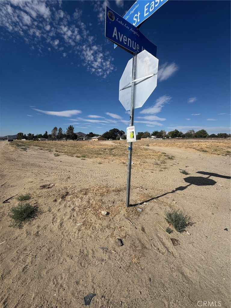 Fantastic Corner Lot in Lake Los Angeles - Over 3/4 Acre! Prime opportunity to own a spacious corner parcel just over three-quarters of an acre in the heart of Lake Los Angeles. All utilities are available, and the property offers excellent access from three directions—making it ideal for building or investment. Just a minute from the town center and zoned for horses, this lot blends rural charm with convenience. Experience peaceful desert living while being only about 30 minutes from the cities of Lancaster and Palmdale. Don't miss this chance to build your dream in a growing community!