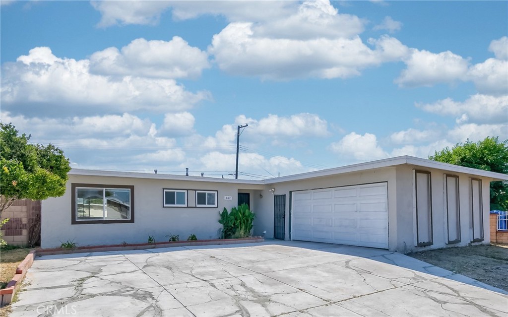 Welcome to this turnkey single-family residence located in La Puente. This home offers 3 good size bedrooms and 2 bathrooms, and 1,118 sq. ft. of living space on a 5,893 sq. ft. lot. Recently remodeled inside and out, the home boasts fresh paint, new laminate flooring, double pane windows, remodeled bathrooms and the kitchen with new kitchen countertop, cabinetry and sink. New water pipes and recess lighting throughout the property. Each bedroom and the living room has its own cooling and heating mini split air condition, which provides energy efficiency. Open and inviting floor plan provides plenty of natural light, creating a warm and comfortable living environment. Enjoy the convenience of an attached 2-car garage with new garage door, new epoxy flooring and even an air conditioner. A sizable backyard, perfect for family gatherings, entertaining, or future customization. A brand-new metal front fence with a motorized electric gate, complemented by a front security camera and motion-sensor lighting, offers enhanced safety for the buyer. Located in a desirable neighborhood near schools, shopping, dining, and easy freeway access, this move-in-ready home is the perfect opportunity for first-time buyers or growing families. Don’t miss your chance to own this move-in-ready home in La Puente!