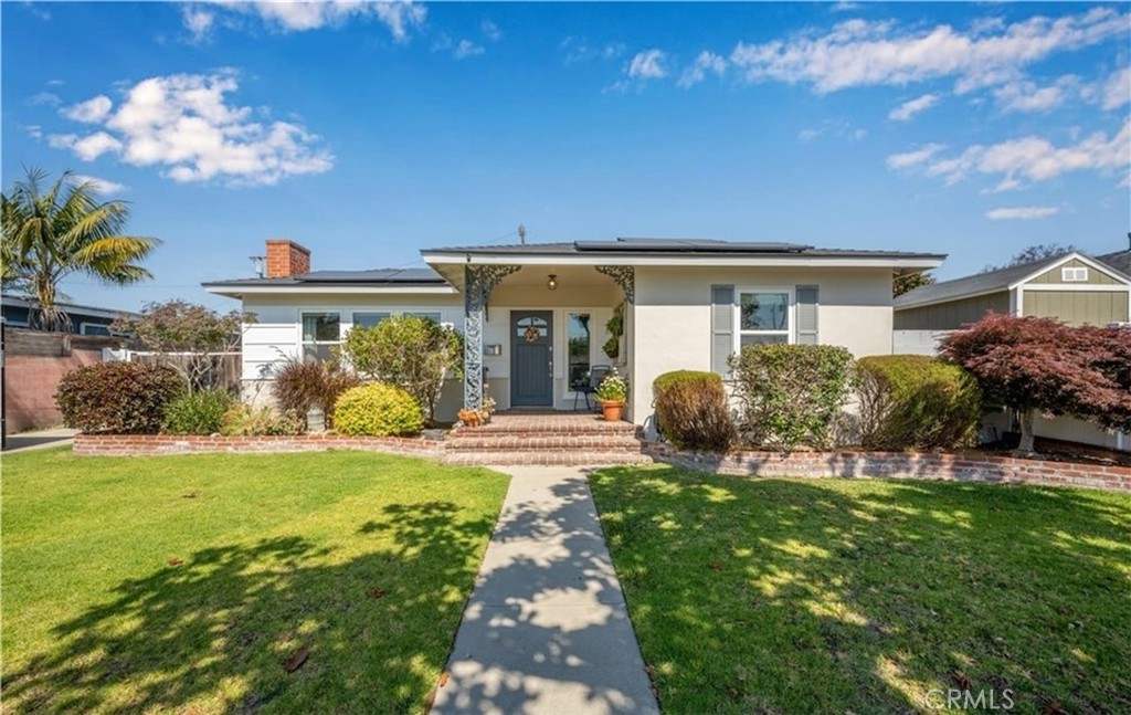 Now available! This beautifully remodeled home is located in the highly desirable Los Altos neighborhood and offers modern comfort, elegant design, and exceptional outdoor living spaces.
The residence features a long driveway with a gated rear entrance leading to a detached two-car garage. Step inside to a dramatic main living area with gleaming hardwood floors, a cozy fireplace, vaulted ceilings, recessed lighting, and a French door that opens to the landscaped rear yard.
The open-concept gourmet kitchen is a chef’s dream, boasting rich wood cabinetry, natural stone countertops, a breakfast bar, and a full suite of stainless steel appliances, including a stove, refrigerator, dishwasher, and microwave. A separate laundry room with built-in cabinets includes a side-by-side washer and dryer.
All three bedrooms are spacious and thoughtfully designed, each with ceiling fans and window treatments. The primary suite features a private ensuite bathroom for added comfort.
The backyard is an entertainer’s paradise, complete with a tranquil koi pond and waterfall feature, as well as a covered cabana with a bar and outdoor cooking appliances. Professionally landscaped front and rear yards create a lush retreat perfect for gatherings or relaxation.
Additional features include central air conditioning and heat, newer windows, and full solar panels for energy efficiency.
This home combines elegance, comfort, and modern upgrades in one of the most sought-after Long Beach neighborhoods.