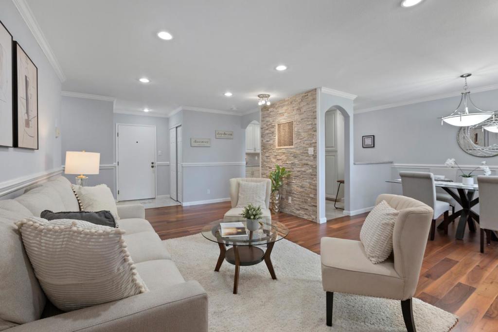 Single story 2nd-floor condominium in the Marina Point Community, offers charming views from an open living-dining space with modern touches, large window, stone wall fireplace, and spacious balcony great for outside entertaining. The updated kitchen includes plenty of custom cabinets, granite countertops, and stainless steel appliances. Dining area overlooks the tall window with greenery views. Laundry room with washer/dryer hookups and storage cabinets. The main suite features a built-in bookcase, double sinks, double closets, and an office/reading space, while the second bedroom offers shelves and plantation shutters over the main window. Enjoy the homeowners association's amenities and close proximity to Bay Levee trails, shopping, parks, and top schools. Ideally located between San Francisco and Silicon Valley, this home is Move-In Ready!