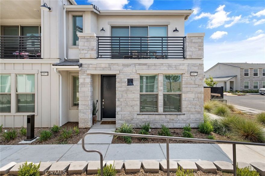 Stylish 2023 Townhome in Lennar's Coveted Brambles Community

Welcome to this nearly new townhome located in the highly desirable, gated Brambles community by Lennar. Built in 2023 and exceptionally maintained, this corner unit home offers a perfect blend of comfort, convenience, and modern style. Enjoy close proximity to premier shopping, dining, and top-rated Clovis North High School.

Step inside to discover an open and airy floor plan filled with natural light. The spacious living area features automatic shades and flows seamlessly into the beautifully designed kitchen, complete with a breakfast bar, quartz countertops, stainless steel appliances, stylish backsplash, and stunning cabinetry.

The home includes essential appliances—refrigerator, washer, and dryer—making it move-in ready. The light-filled primary suite offers a large walk-in closet and a relaxing retreat, while the first floor includes a private bedroom with ensuite bathroom and a separate laundry room for added convenience.

Unwind on your front balcony or take advantage of the community’s impressive amenities, including a pool, fire pit, and inviting gathering spaces—all within a secure, gated setting.

This property also includes owned solar, adding energy efficiency and value. Whether you're looking for a chic new residence or a low-maintenance investment opportunity, this home checks all the boxes.

Don’t miss your chance to own in one of the area’s most sought-after communities—schedule your tour today!