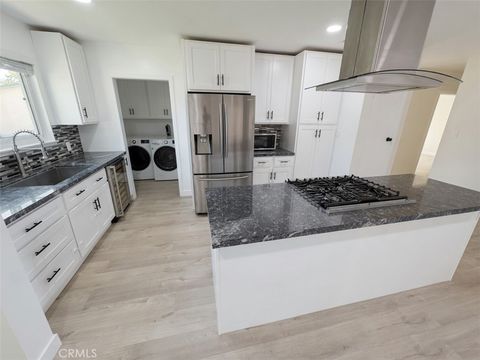 Photo of 1415 E Gary Place, Anaheim, CA 92805 (MLS # OC26147131)