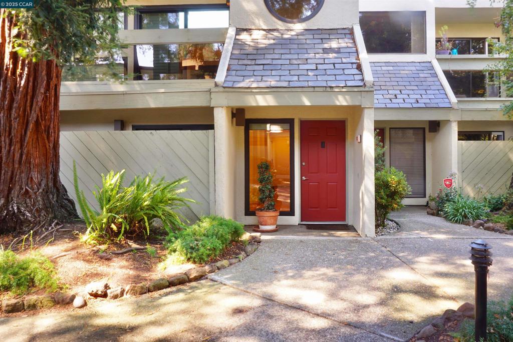 Location, Location, Location ~ closed to "Everything Downtown Pleasant Hill". Glorious Kitchen/Family combo with 14'+ ceilings in family room. Recently updated kitchen, beautiful backsplash ~ Lovely Living! Large Master Suite on the ground floor an updated master bath plus a walk-in closet. Attached 2 car garage and full sized laundry also on ground floor. 2 more bedrooms and updated hall bath on the 2nd floor. Murphy bed in one of the two beds. Small complex with just 26 homes, mature redwoods beautify the greenbelt. Amazing commute location.