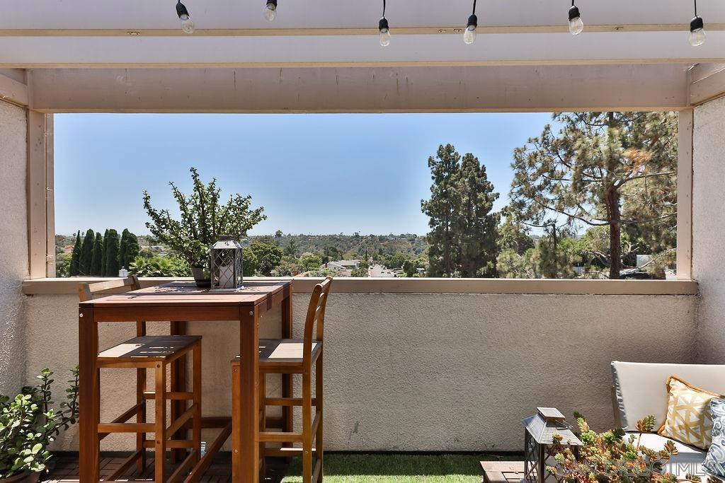 View! Top floor end unit has incredible area mountain view. One bedroom and one bathroom unit with large balcony and one car garage located below. Nice complex with low HOA fees, pool, and laundry room. Great location, close to shopping, parks, and freeway access. This unit has new flooring throughout and new paint and other upgrades. Condo gets lot of natural sunlight and is move in ready!