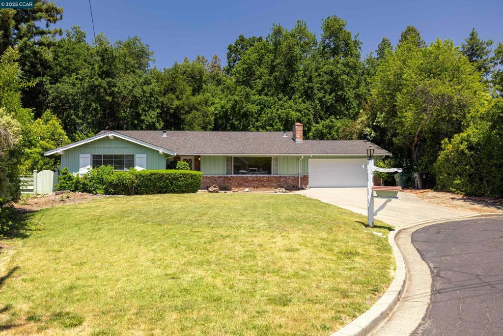 This is a very special property. Single level with the best location, location, location... Perfect for any family for daily school or shopping or access to work. Built by the current family and enjoyed for all these years. Large, private, treed yard at the back of a cul-de-sac. Wonderfully maintained homes in this small neighborhood. Expansive living and family rooms each with a fireplace. The wonderful kitchen, breakfast room have loads of cabinet space as well as great counter tops, with views of the lush rear yard. Newer roof.
