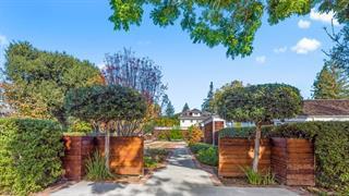 Perfectly located in the heart of Palo Alto, this one level ranch style home is situated on a expansive, private lot in the Professorville neighborhood. Large rooms, high ceilings and lots of windows to bring in natural light to all the living spaces. Each bedroom has an attached bathroom and a generous sized family room with privacy doors can serve as a 4th bedroom. Hardwood floors throughout and freshly painted. Just a few short blocks, to top Palo Alto Schools, downtown Palo Alto, Town and Country Village and Stanford University. Wonderful home in a wonderful neighborhood!