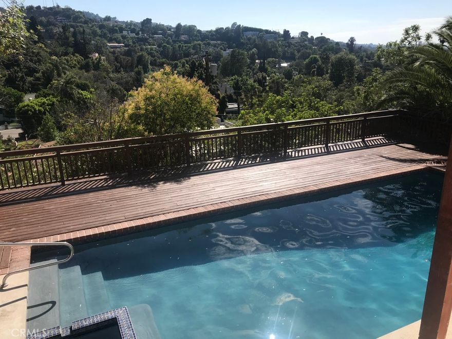 Studio City retreat south of the Boulevard with breathtaking hillside views and timeless California style. This split-level residence features a newly updated pool and spa, expansive living and dining areas with dramatic picture windows, and a chef’s kitchen with abundant counter space. The serene primary suite offers direct access to the outdoors, while generous secondary bedrooms provide flexibility for family, guests, or a home office. Multiple patios and entertaining areas make this an ideal setting for al fresco dining or evening relaxation. Perfectly located just moments from Ventura Boulevard’s fine dining and shops, with easy canyon access to the Westside and freeways. A rare lease opportunity in one of Studio City’s most desirable neighborhoods.  Inquire regarding Furnished Leased.