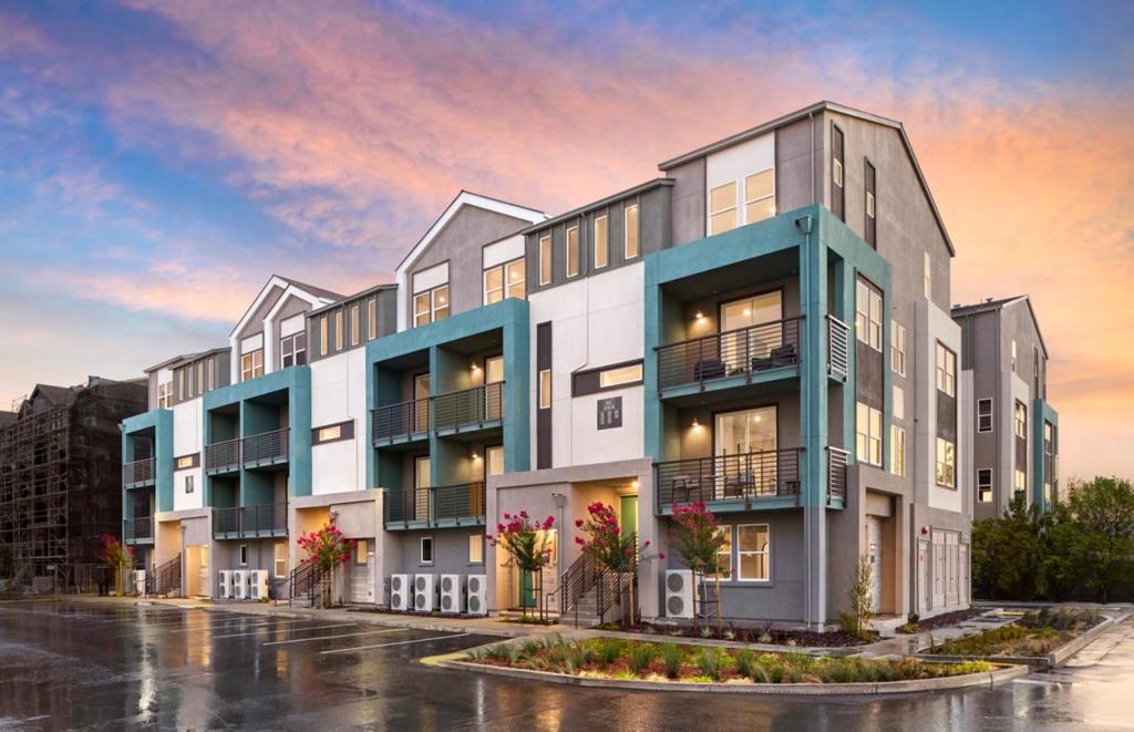 This stunning Plan 2 features an open floor plan, a spacious kitchen island perfect for entertaining, a main-level bed and bath, and a luxurious owners suite with dual vanities. Enjoy stylish, low-maintenance LVP flooring throughout the entire home. Photos are of model home not of actual home.