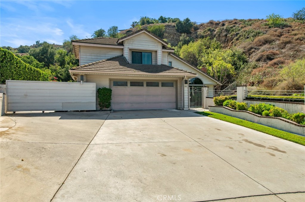 MAGNITICENT 2-STORY HOME IN THE PRESTIGLOUS SOUTH HILLS NEIGHBORHOOD!*PRIDE OF OWNERSHIP AND OUTSTANDING CURB APPEAL*BEAUTIFUL LIMESTONE ENTRY WELCOMES YOU INTO A GREAT FLOOR PLAN THAT OFFERS A BRIGHT LIVING ROOM WITH A FIREPLACE AND OPENS TO A FORMAL DINING AREA WITH A NICE VIEW OF THE BACKYARD* KITCHEN WITH STAINLESS STEEL APPLIANCES, GRANITE COUNTER TOPS AND LIMESTONE TILE FLOORING OVERLOOKS THE FAMILY ROOM* UPSTAIRS FEATURES A SPACIOUS MASTER BEDROOM WITH A BALCONY AND A PRIVATE MASTER BATH WITH DUAL SINKS AND A WALK-IN CLOSET* 2 GOOD SIZED BEDROOMS*2.5 BATHROOMS, PRIVATE BACKYARD FEATURES A SPARKLING POOL, LARGE GRASS AREA AND A COVERED PATIO WITH A BUILT-IN BBQ, PERFECT FOR RELAXING OR ENTERTAINING*2-CAR ATTACHED GARAGE WITH DIRECT ACCESS TO THE HOME AND RV PARKING*FEATURES.