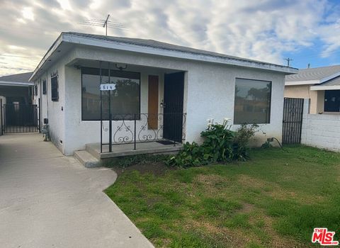 Photo of 814 E 104th Street, Los Angeles, CA 90002 (MLS # 25602675)