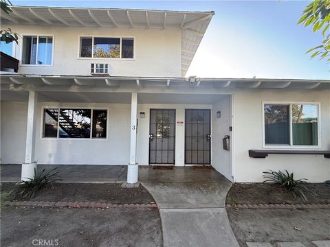 Photo of 7672 Amazon Dr #3, Huntington Beach, CA 92647 (MLS # OC26024886)