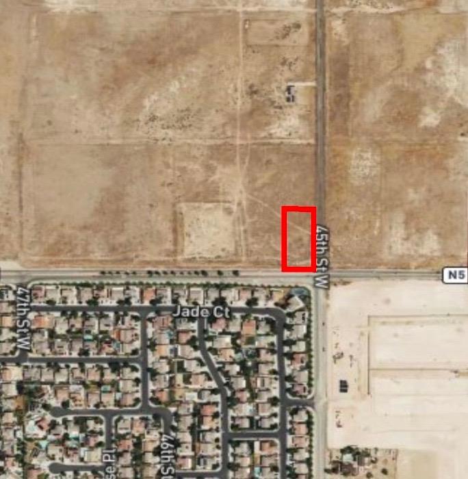 Corner Lot across from newer developed community.