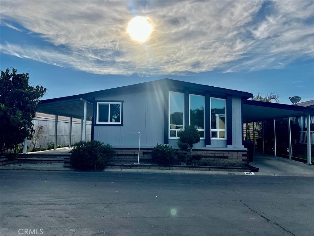 Welcome Anaheim Shores! This Amazing Mobile Home features 3 bedrooms 2 full bathrooms. New Stove, New Windows, Ne laminate floors, new interior and exterior paint, new showers, new toilets, new cabinets in the kitchen bathrooms. Has a exterior storage and a nice porch.
