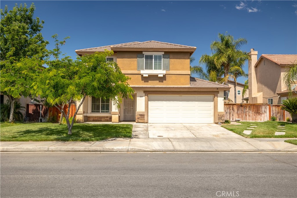 Beautiful and spacious five bedroom home in West Hemet just steps away from Harmony Elementary School! The home features carpet/wood laminate flooring, neutral paint colors, RV Parking and a landscaped backyard. And did I mention...PAID OFF TESLA SOLAR! The solar panels generate electricity for the home reducing utility costs; while the 220V outlet in the garage offers a convenient charging option for electric vehicles or other high demand appliances. As you enter the home, you will find a large formal living room with two story vaulted ceiling and the formal dining room. Around the corner is a very spacious kitchen with tons of cabinets and a center island, a breakfast nook and desk area. Kitchen opens to family room with fireplace. You will love the downstairs guest bedroom and full bath. Upstairs you are greeted by a loft...TV/Game area and four additional bedrooms. The light filled primary bedroom has a vaulted ceiling and luxurious bath with double sinks, separate tub and shower, complete with two wall-to-wall closets! The third full bath is situated just off the loft area with easy access from all the secondary bedrooms. Step out back to a very peaceful backyard with wraparound concrete patio/walkway. Both side yards are spacious...use one as a doggy run area or for parking the RV, boat or work truck. This home has it all. Hurry it won't last long!