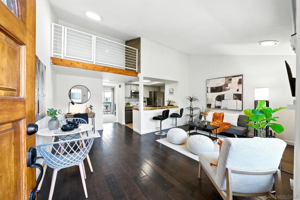Welcome to your private retreat in one of San Diego’s most vibrant and walkable neighborhoods, Normal Heights! This beautiful top-floor 1-bed + loft, 1-bath condo offers rare space, style, and flexibility in a peaceful pocket just steps from the energy of Adams Avenue. Soaring vaulted ceilings and an open, light-filled layout create an airy, welcoming vibe, while the versatile loft provides the perfect space for a home office, creative studio, or cozy lounge. Enjoy modern comforts like central heat and A/C, in-unit laundry, and a spacious walk-in closet. Step outside to your own private patio, ideal for morning coffee or relaxing in the San Diego sunshine. An assigned 1-car garage plus an additional off-street parking space in your assigned driveway offer exceptional convenience, a true rarity in the area. Nestled on a quiet, tree-lined street within walking distance of local cafés, boutiques, and eateries, this condo delivers the best of both worlds: tranquil living with an unbeatable urban lifestyle!
