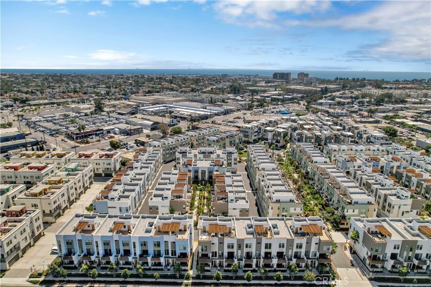 Experience modern coastal living in this newer, energy-efficient townhome nestled within the sought-after 17 West community. Designed with contemporary style and thoughtful functionality, this residence boasts high ceilings, an open-concept main living area, and a versatile ground-level office or creative space complete with an ADA-compliant restroom.



Built for comfort and sustainability, the home features advanced energy-saving elements including foam insulation, dual-pane Low-E windows, high-efficiency HVAC, a tankless water heater, and LED lighting throughout.



Residents of 17 West enjoy access to an array of lifestyle amenities, gather with neighbors around the fire pits, host weekend barbecues, or play a round of bocce ball, all just steps from your door. Ideally situated in the vibrant heart of Costa Mesa, 17 West offers unparalleled convenience with premier dining, shopping, and parks nearby. All with the added bonus of having access to the beach just over a mile away.